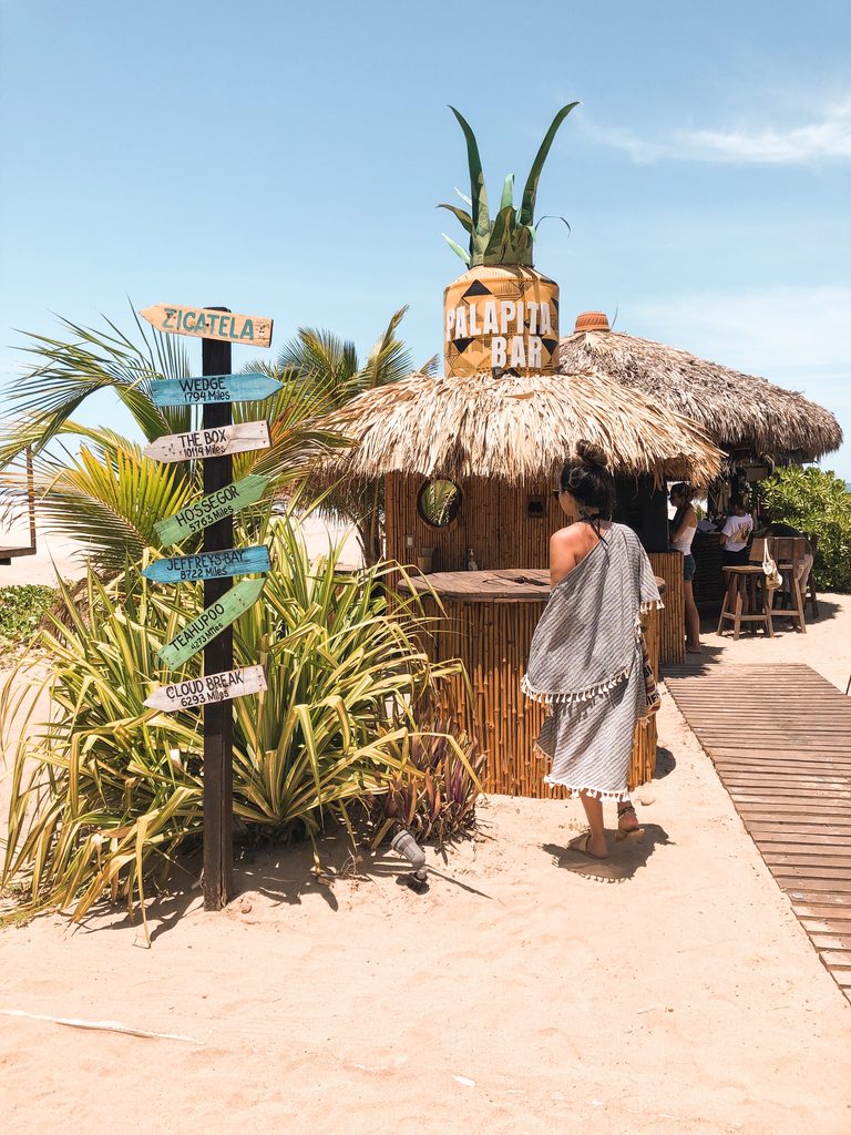 image in front of a bar at playa zicatela