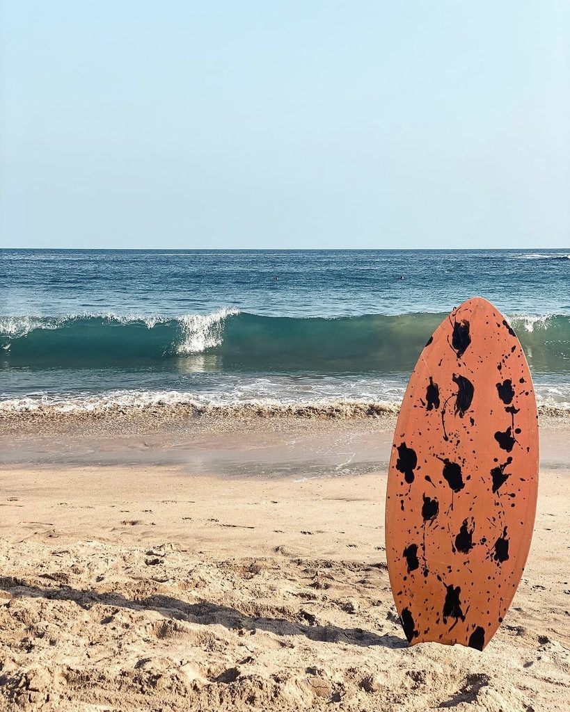 surfboard at mazunte beach for blog post on how many days in Puerto Escondido